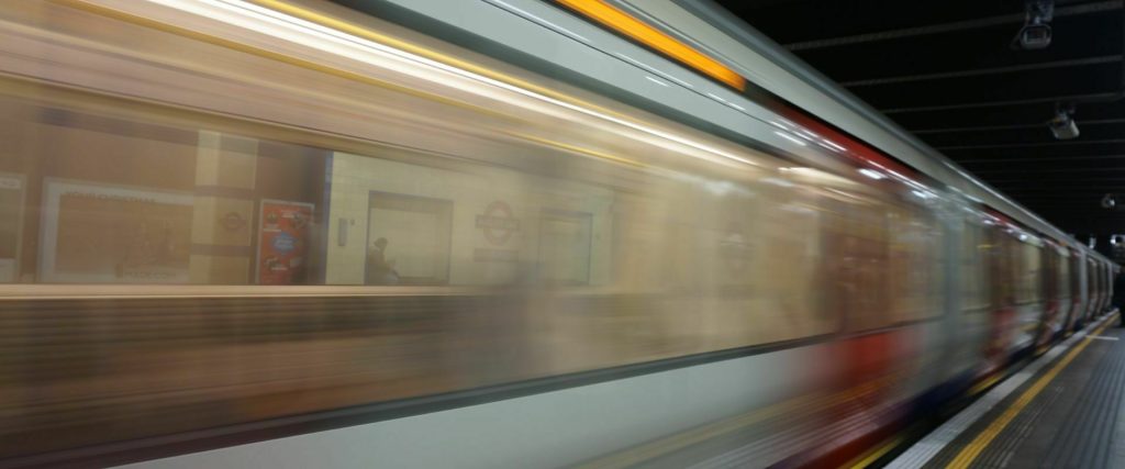 A blurry image of a metro train