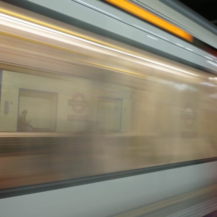 A blurry image of a metro train