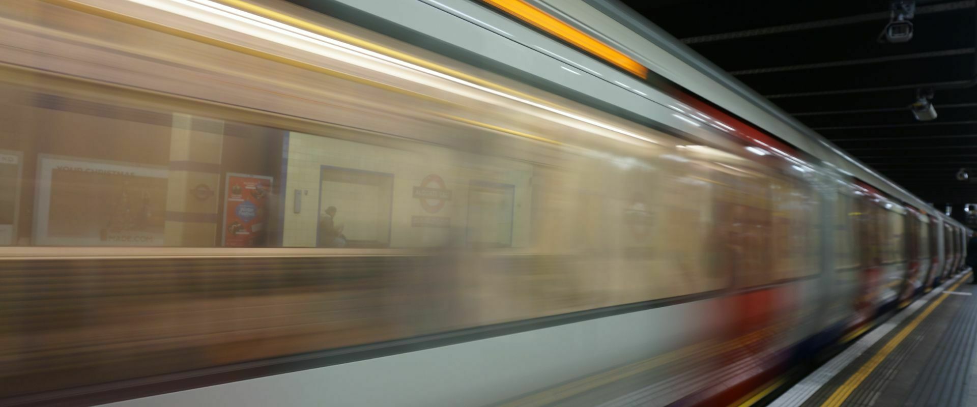 A blurry image of a metro train