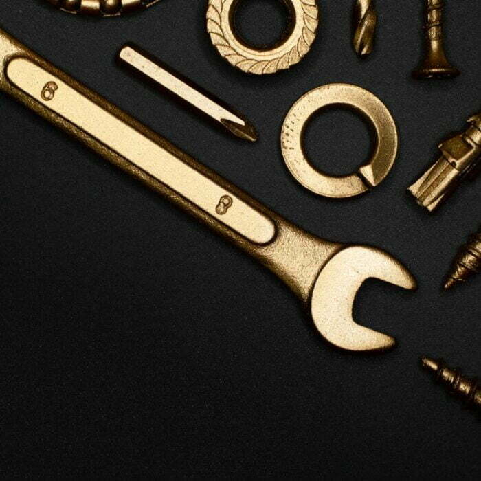 A close-up of wrenches and screws